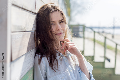 Summer portrait of happy young beautiful woman with a smile photo