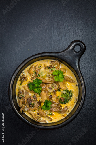 Oyster mushroom soup with vegetables photo