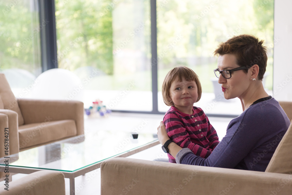 mother and cute little girl enjoying their free time mother and cute little girl enjoying their free time