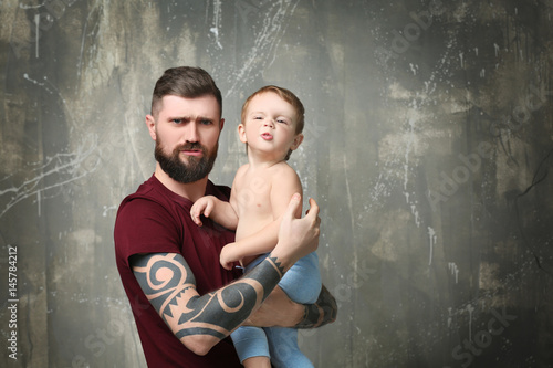 Handsome tattooed young man...