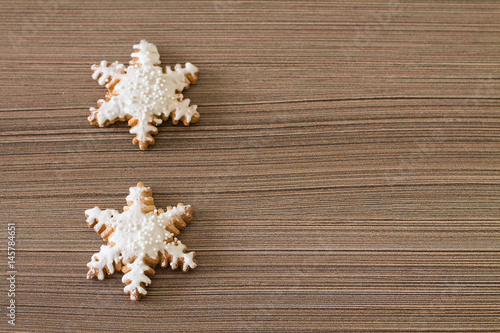 Wallpaper Mural Gingerbread snowflake on wood background. Aerial view. Copy space. Torontodigital.ca