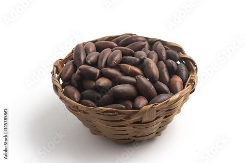 Brazilian Castanha de Baru Nut into a basket