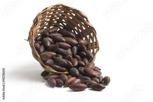 Brazilian Castanha de Baru Nut into a basket photo