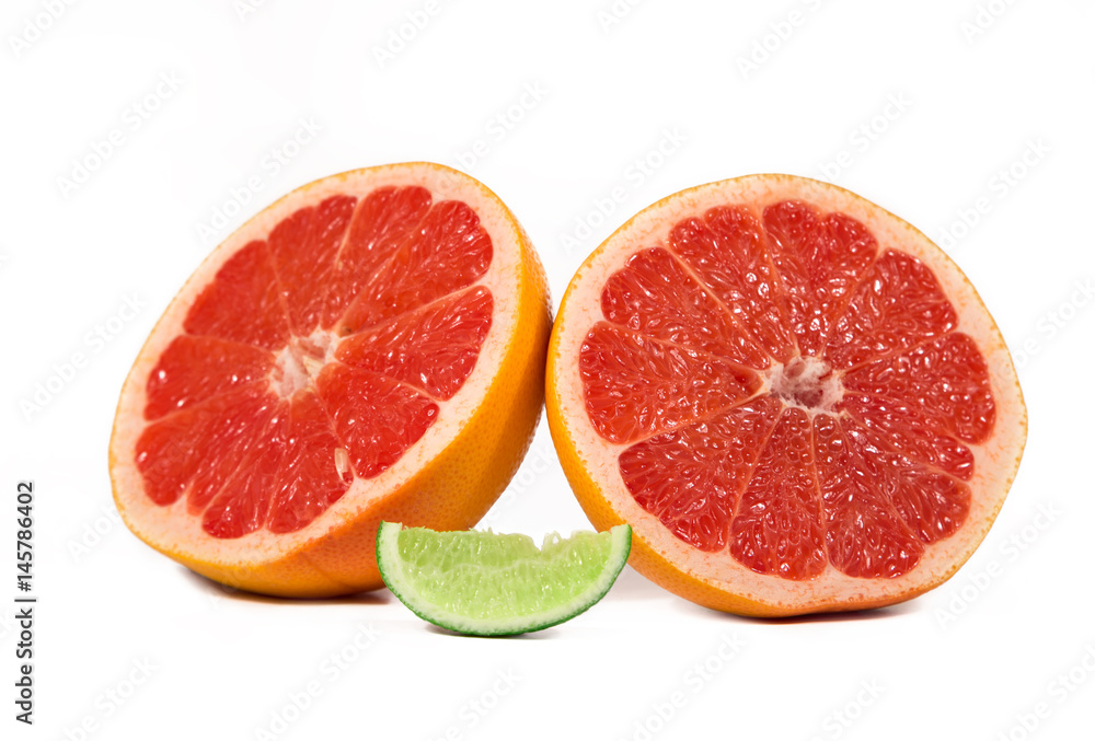 Grapefruit Citrus Fruit With Half Grapefruit Isolated on White Background. And Lime With Clipping path Grapefruit Citrus Fruit With Half Grapefruit Isolated on White Background. And Lime With Clipping path