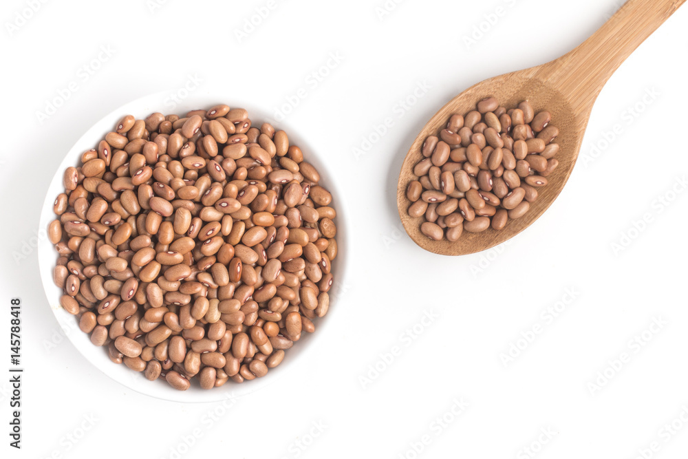 Brown Mulatinho Beans into a bowl Brown Mulatinho Beans into a bowl