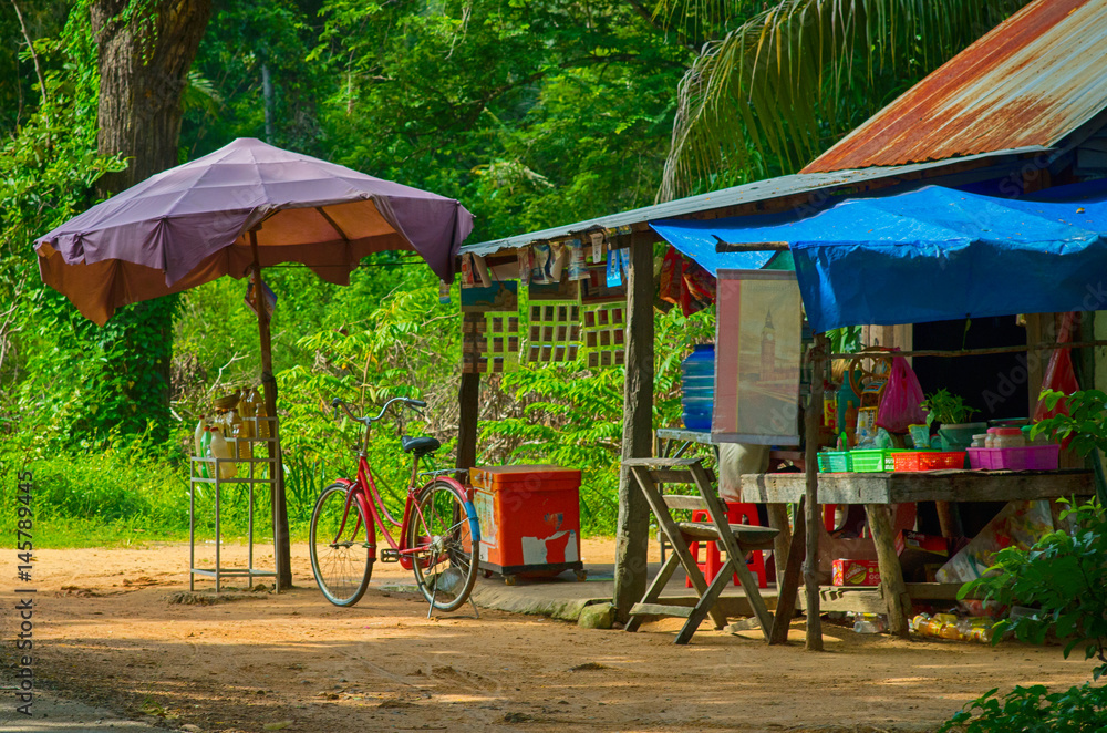 Petrol inside bottles on the road in Cambodia Petrol inside bottles on the road in Cambodia