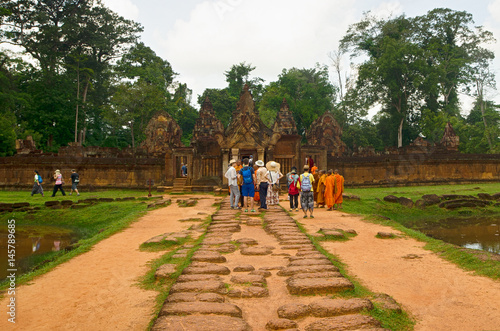 People are going to Banteay Srei Temple in Cambodia.