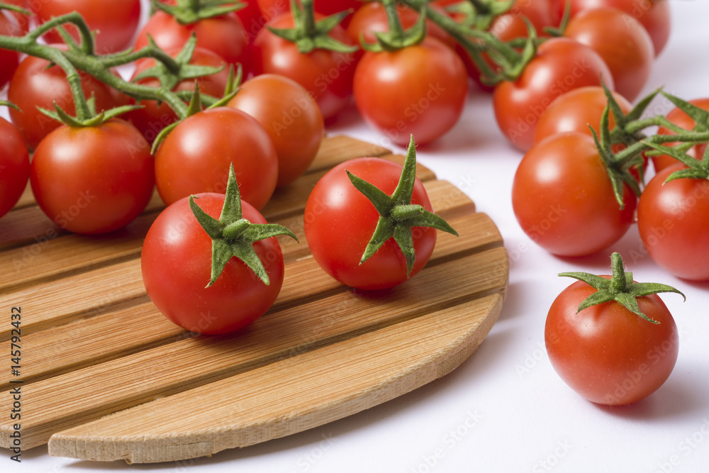 Cherry tomato, isolated on white background Cherry tomato, isolated on white background