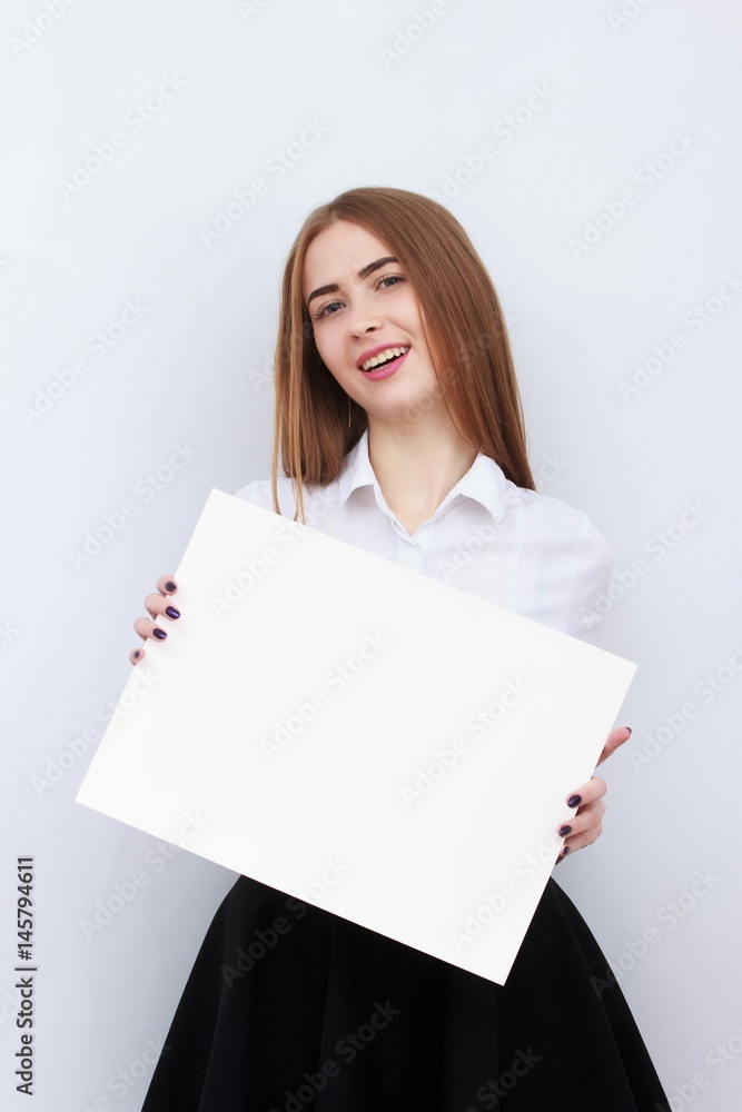 Advertising. Young smiling woman show blank board on white background. Advertising. Young smiling woman show blank board on white background.