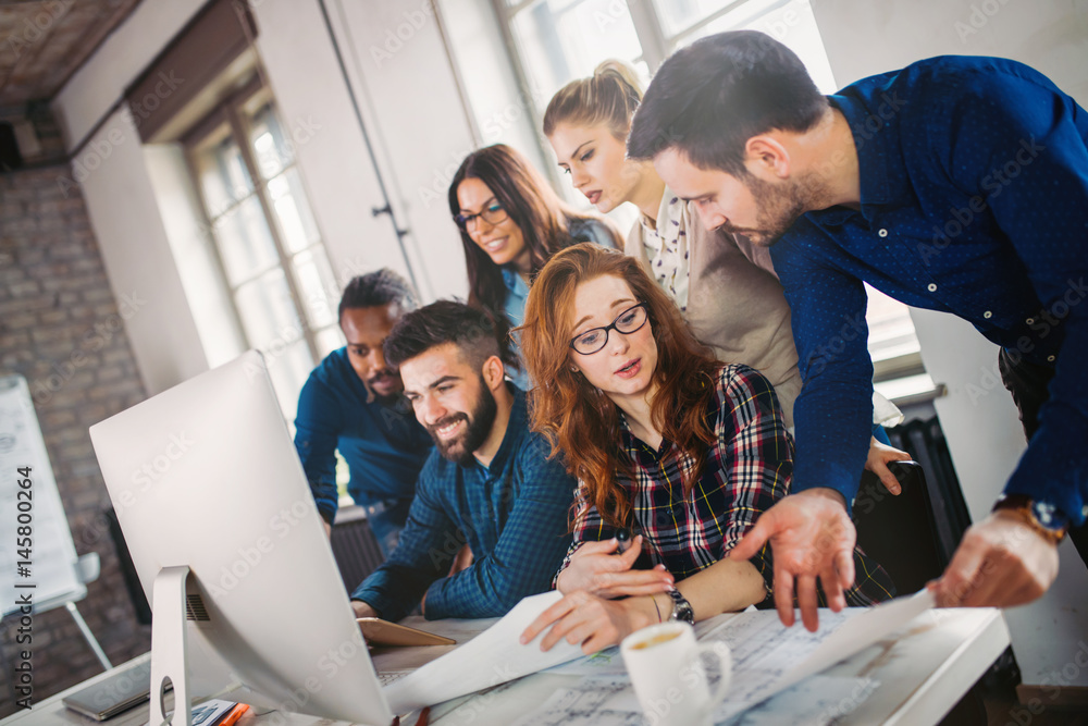 Fototapeta premium Company employees working in office
