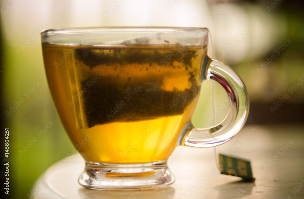 Green Tea in Glass Cup. Bokeh Background Green Tea in Glass Cup. Bokeh Background
