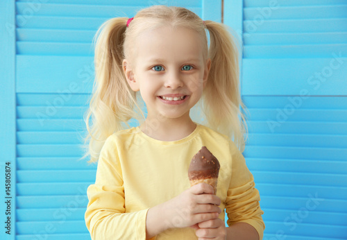 Cute little girl eating ice...