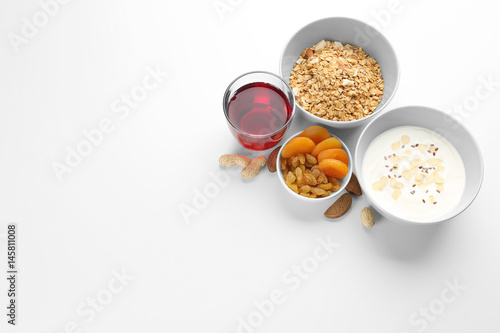 Composition with tasty yogurt on white background