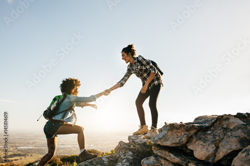 Two young women hiking in nature