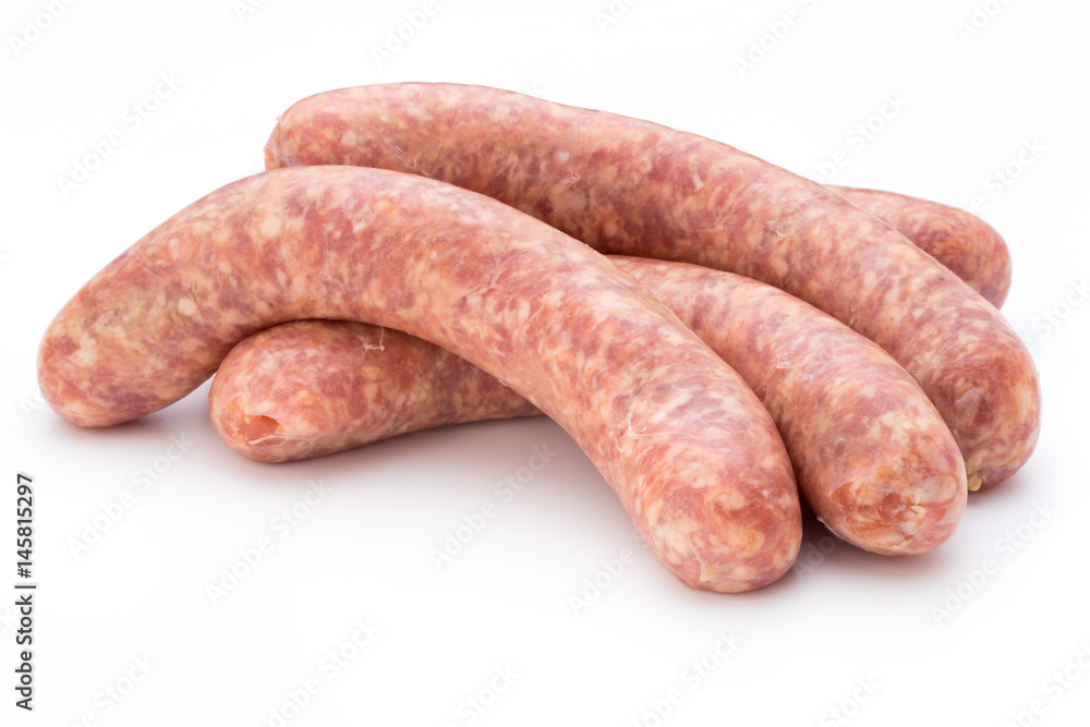 Raw sausage with parsley leaf isolated on white background. Raw sausage with parsley leaf isolated on white background.
