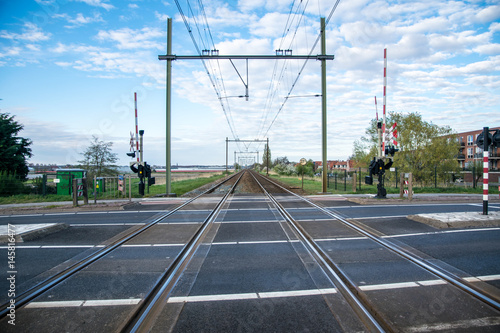 train road with some clouds and blue sky