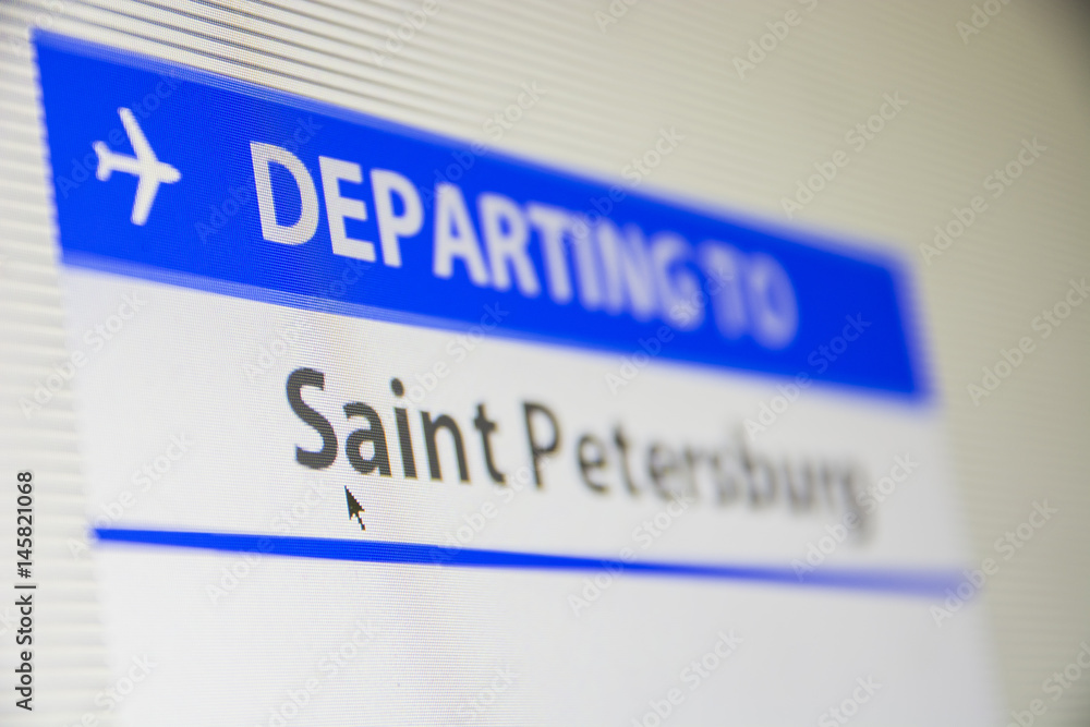 Computer screen close-up of status of flight departing to Saint Petersburg, Russia Computer screen close-up of status of flight departing to Saint Petersburg, Russia