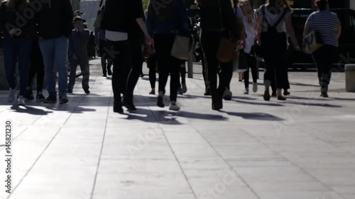 Crowd of people walking, busy city street