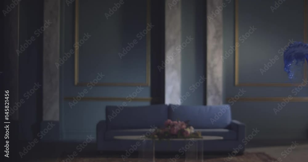 Slow motion, blue liquid flies across room Slow motion, blue liquid flies across room