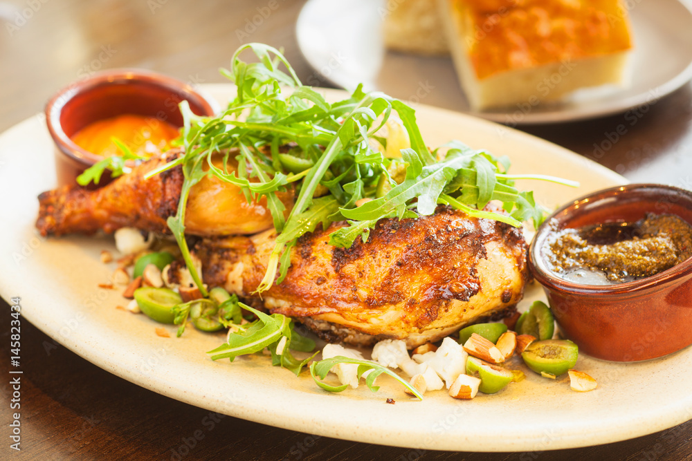 spit-roasted half chicken with bread