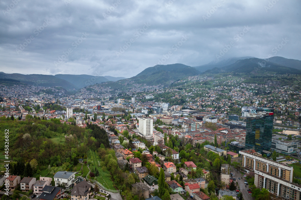 Aerial view of Sarajevo during a cloudy and rainly day of spring.