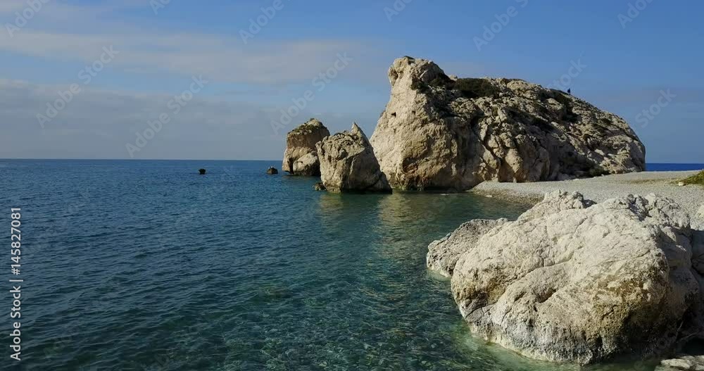 The bay of Aphrodite. Coast, beach, sea, rocks. Cyprus. Mediterranean Sea Place for travel and rest. health resort The bay of Aphrodite. Coast, beach, sea, rocks. Cyprus. Mediterranean Sea Place for travel and rest. health resort
