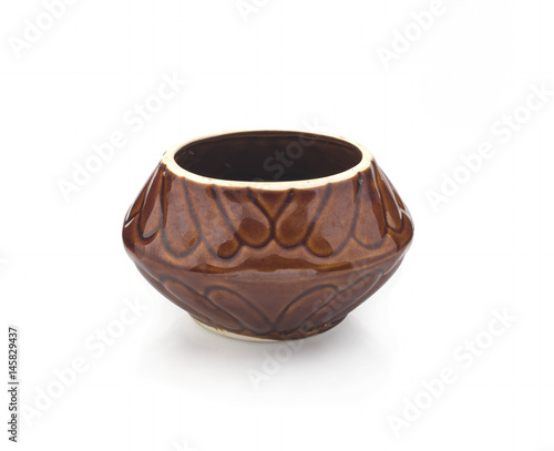 Pot of clay for roast with a handle on a white background