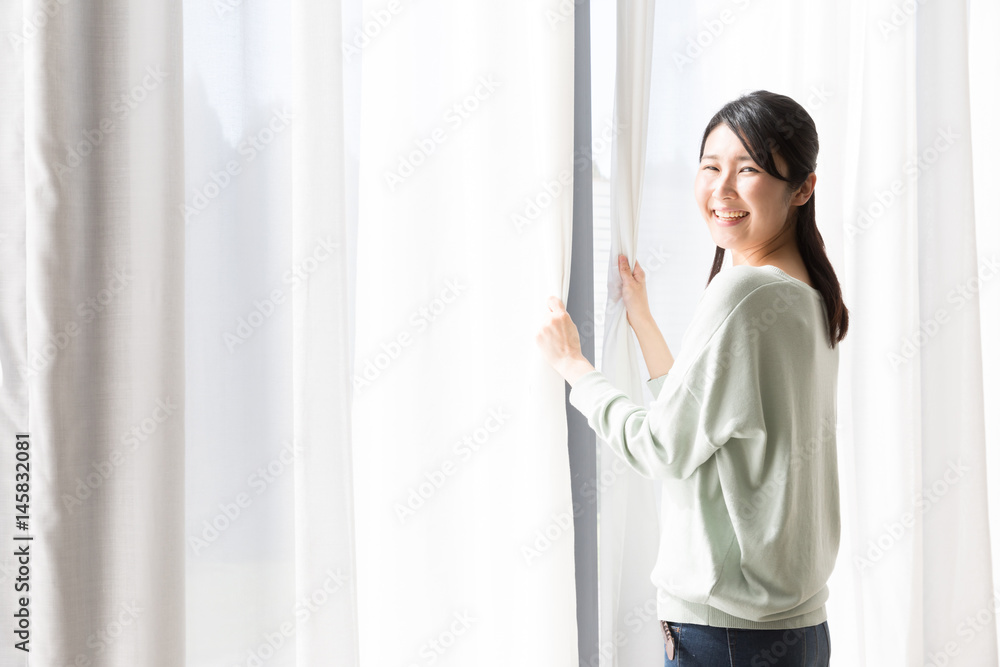 attractive asian woman bathing in the sunlight attractive asian woman bathing in the sunlight