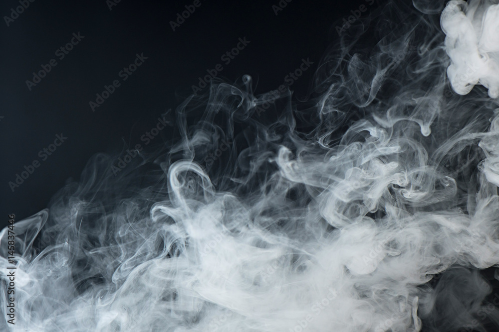 Abstract white water vapor on a black background. Texture. Design elements. Abstract art.