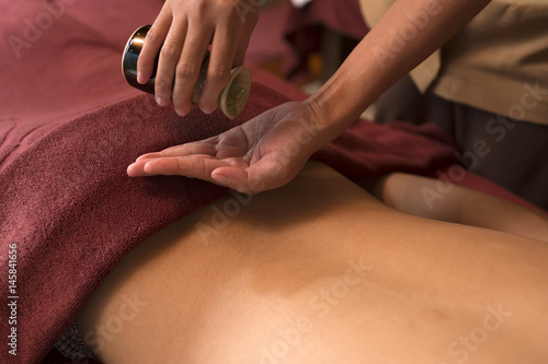 Wallpaper Mural Hand pouring oil for massage in spa Torontodigital.ca