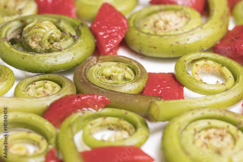 Fiddlehead Ferns and Red Pepper Pieces photo