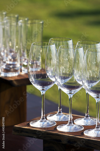 Empty wine glasses prepared for serving