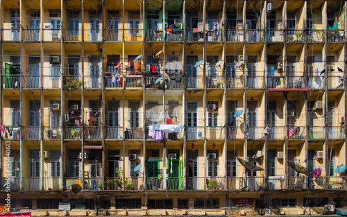 Facade of old residential building in Yangon, Myanmar.