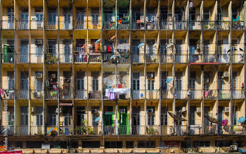 Facade of old residential building in Yangon, Myanmar. photo