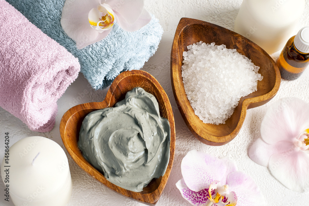 Spa setting. Cosmetic body mask made of blue clay, sea salt Spa setting. Cosmetic body mask made of blue clay, sea salt