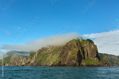 Rocks in the Avacha Bay of the Pacific Ocean. Coast of Kamchatka.