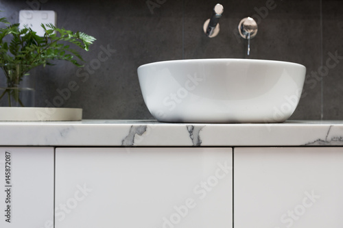 Close up of bathroom basin ...