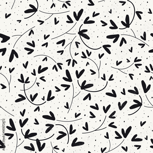 Black heart shaped leaves seamless vector pattern on white background.