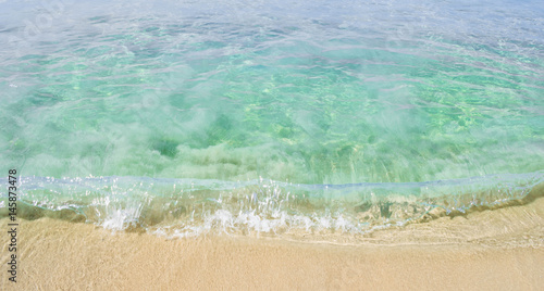 Fototapeta Naklejka Na Ścianę i Meble -  Soft Wave Of Ocean On Sandy Beach. Background. Selective
