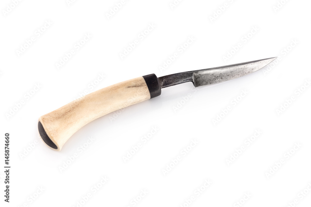 Isolated ancient hunting knife with wooden handle at white background. Isolated ancient hunting knife with wooden handle at white background.
