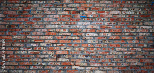 Aged red brick wall background