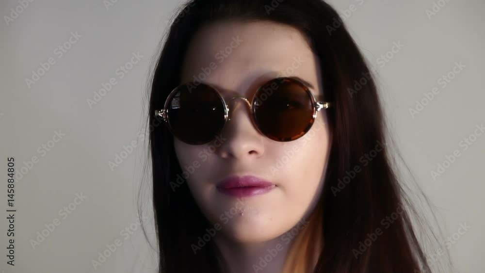 Portrait of a girl in sunglasses Portrait of a girl in sunglasses