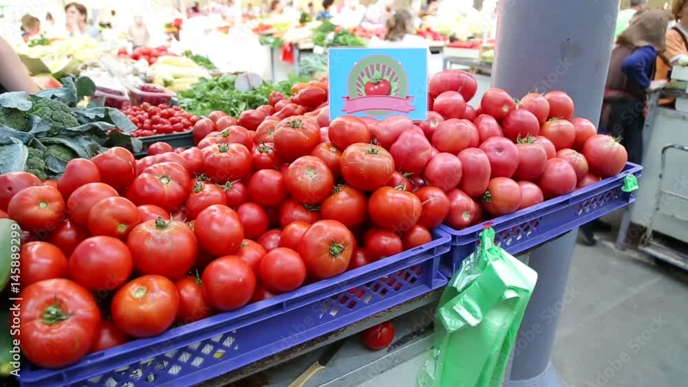 Fresh tomatoes on the market stall Fresh tomatoes on the market stall