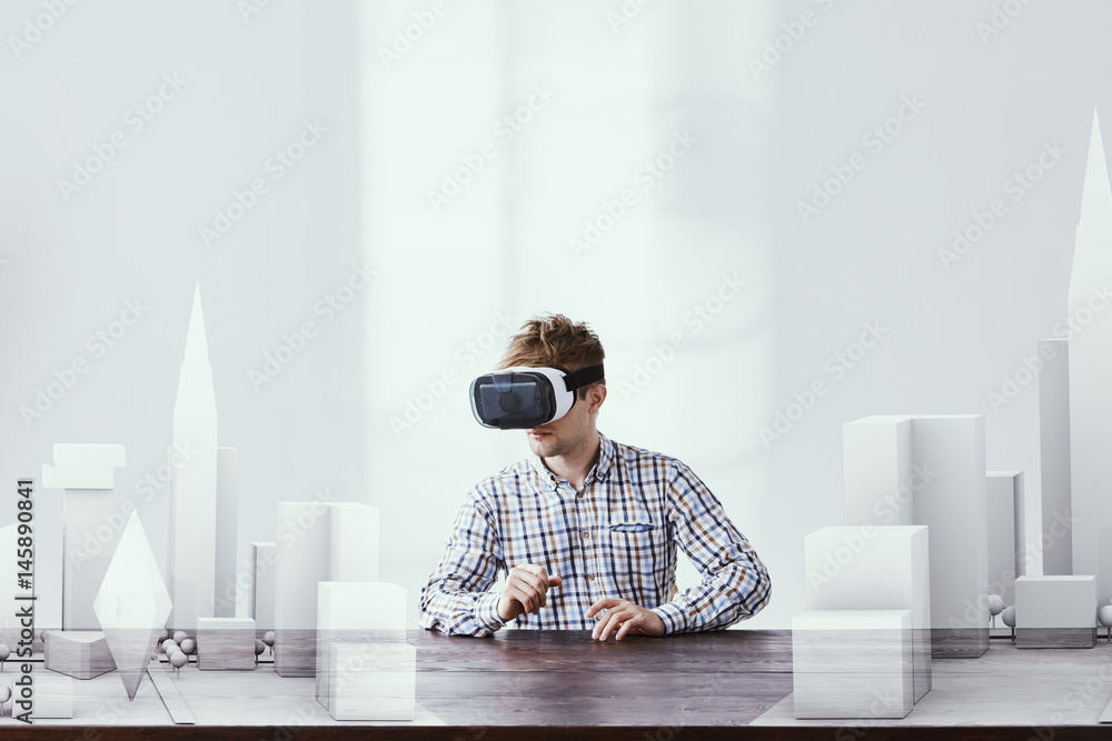 Architect using vr goggles Architect using vr goggles