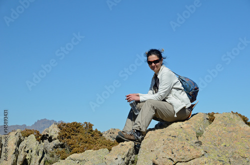Tourist in the Corsican high mountains © OlegMit