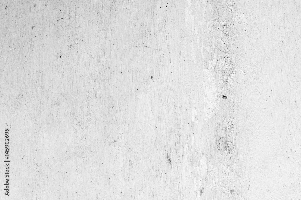 Fototapeta premium Wall fragment with scratches and cracks