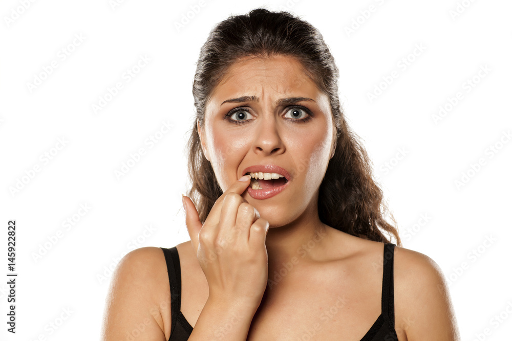 The young brunette has a toothache The young brunette has a toothache