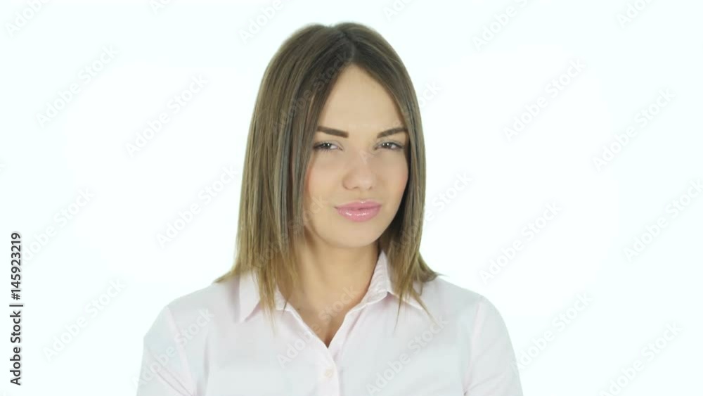 Thumbs Down by Beautiful Woman, White Background Thumbs Down by Beautiful Woman, White Background