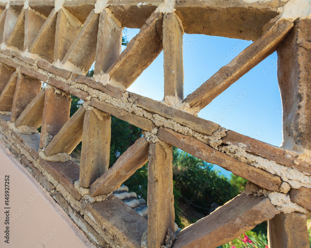 Old balcony railings made of clay bricks Old balcony railings made of clay bricks