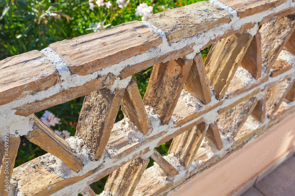 Old balcony railings made of clay blocks Old balcony railings made of clay blocks